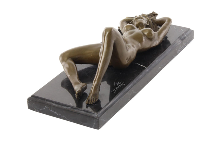 Bronze sculpture of a reclining sensual female nude