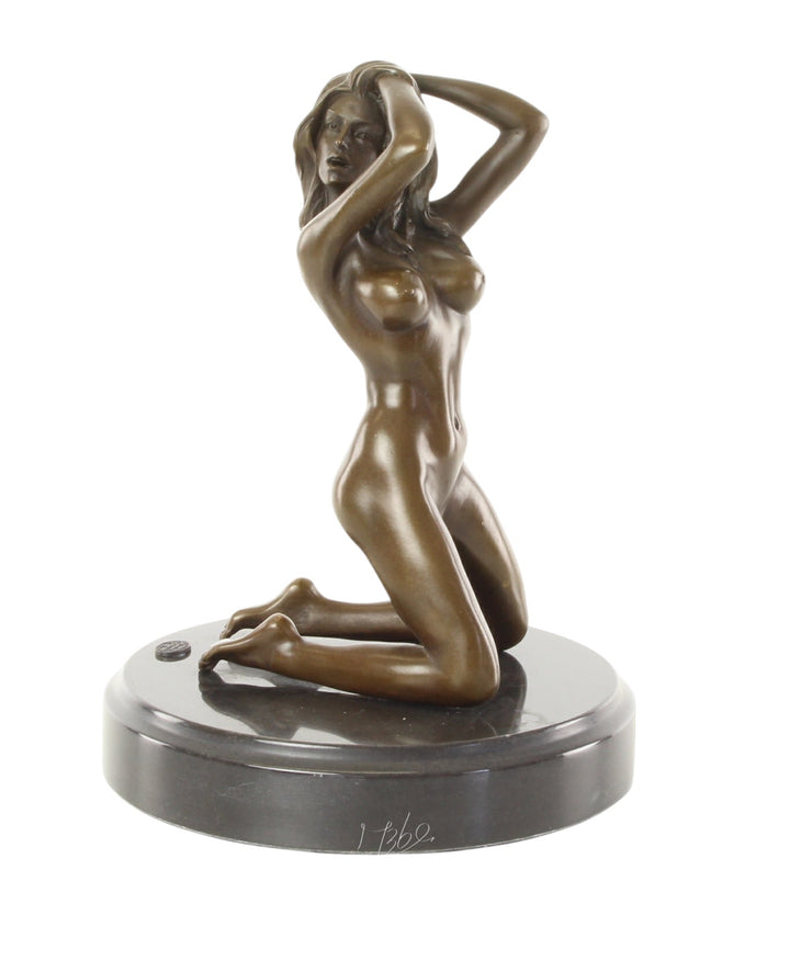 Erotic bronze sculpture of a female nude posing on her knees