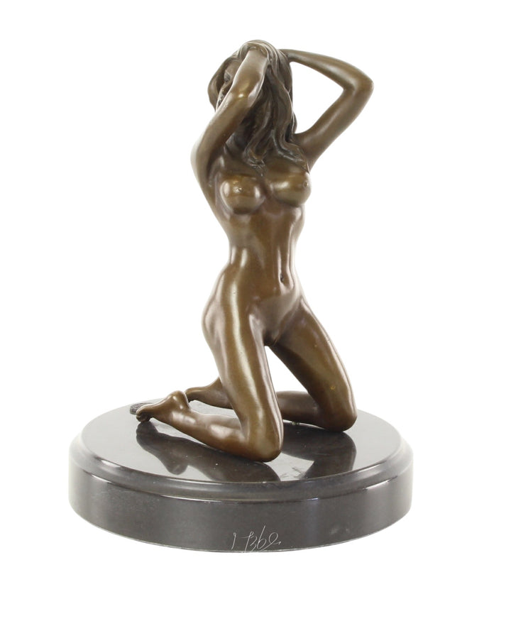 Erotic bronze sculpture of a female nude posing on her knees