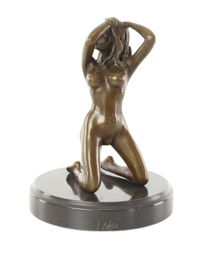 Erotic bronze sculpture of a female nude posing on her knees
