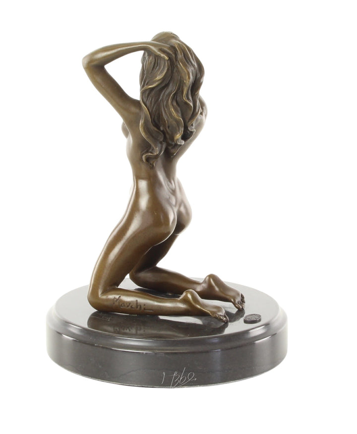 Erotic bronze sculpture of a female nude posing on her knees