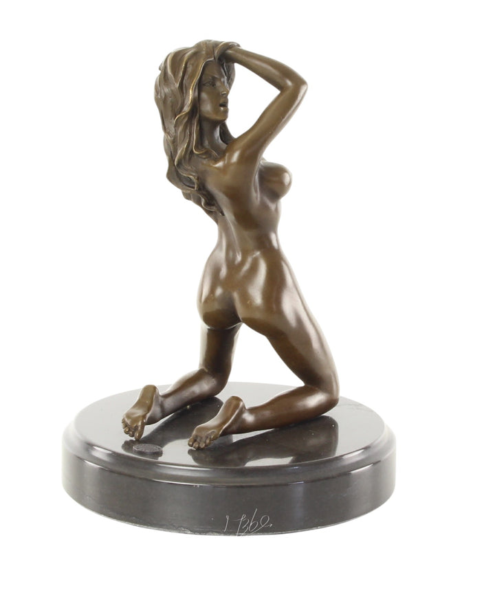 Erotic bronze sculpture of a female nude posing on her knees