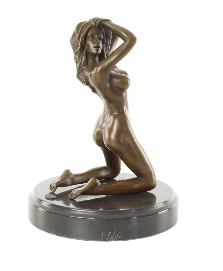 Erotic bronze sculpture of a female nude posing on her knees