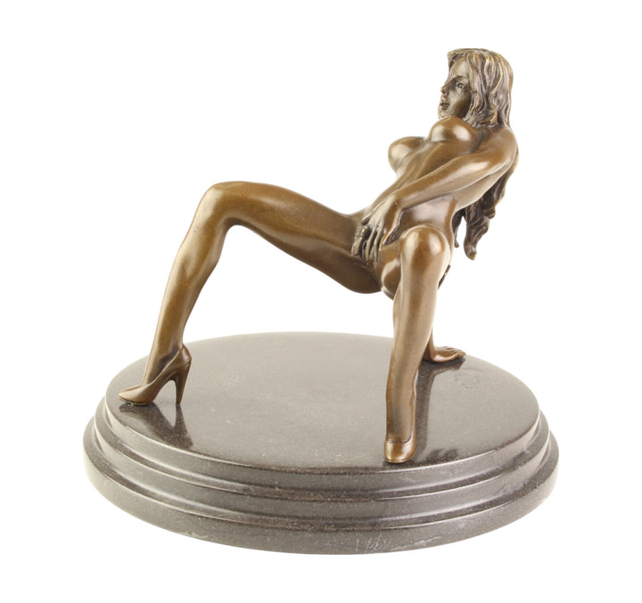 Bronze sculpture of a female nude pleasuring herself