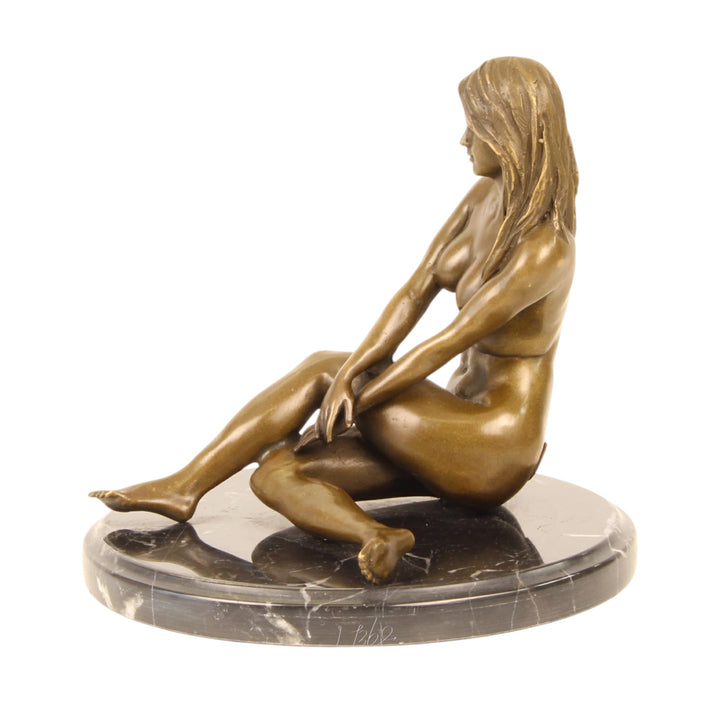 Erotic bronze sculpture of a sitting nude female