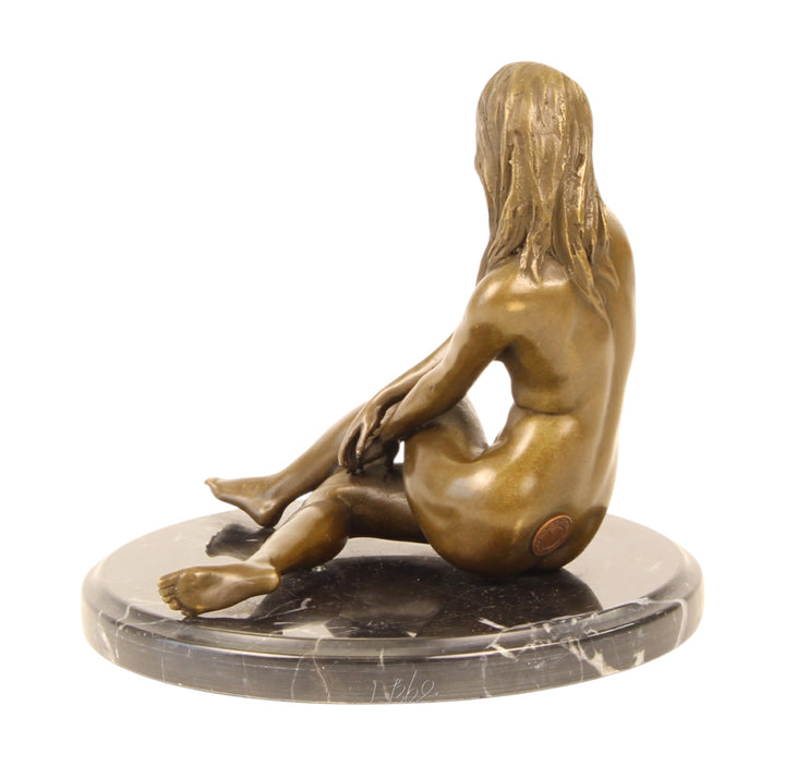 Erotic bronze sculpture of a sitting nude female
