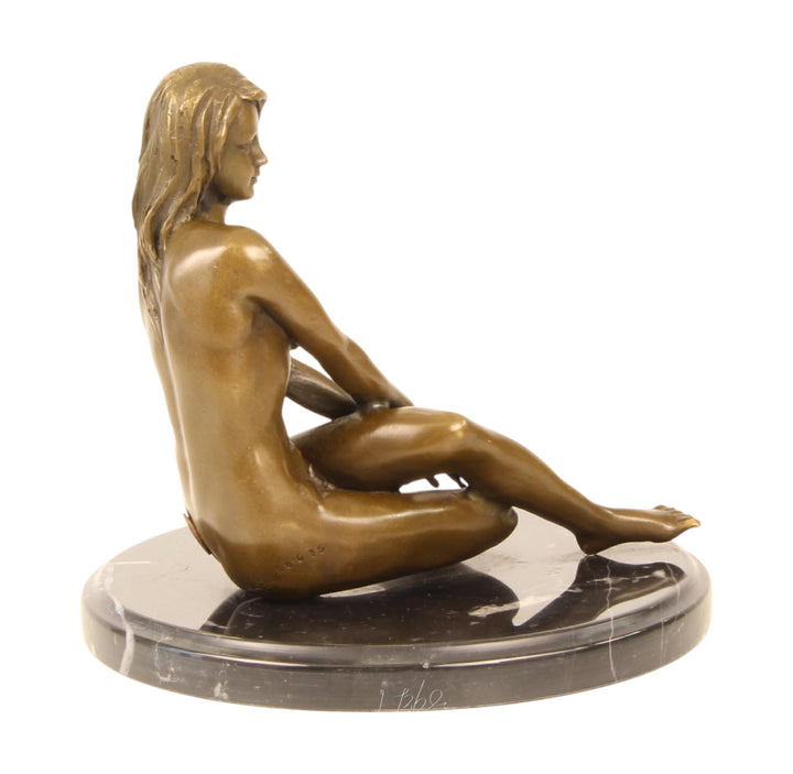 Erotic bronze sculpture of a sitting nude female
