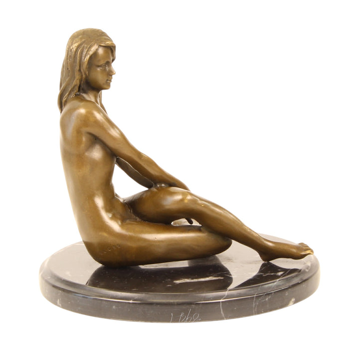 Erotic bronze sculpture of a sitting nude female