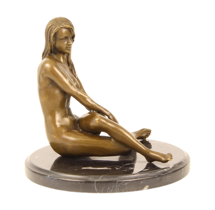 Erotic bronze sculpture of a sitting nude female