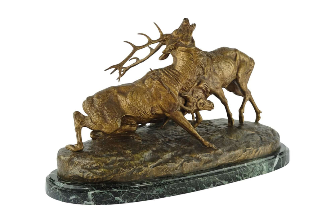 Antique bronze sculpture of two fighting stags by Charles Masson, 19th-century French artwork, detailed design.