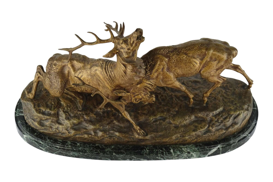 Antique bronze sculpture of two stags fighting in a dramatic pose by Charles Masson, 19th century, France.