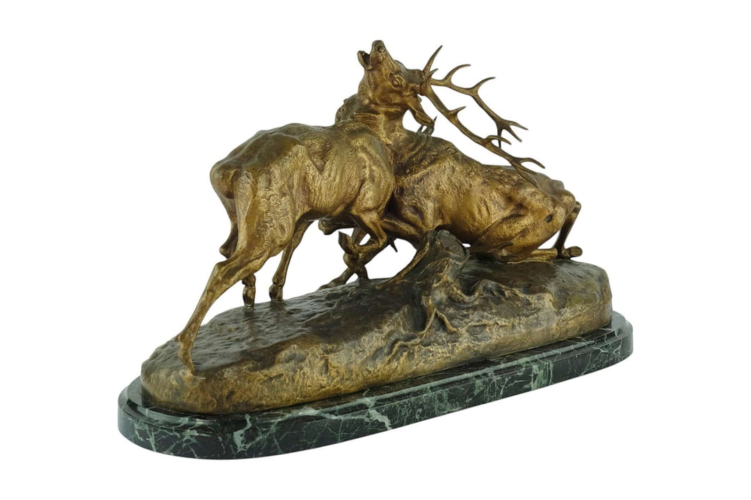 Antique bronze sculpture of two stags fighting, created by Charles Masson, 19th century, France.