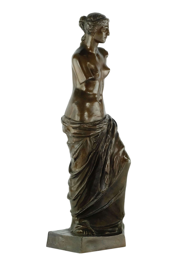 Antique bronze sculpture of Venus by Milo, depicting the Roman goddess of love with elegant drapery and a warm patina.