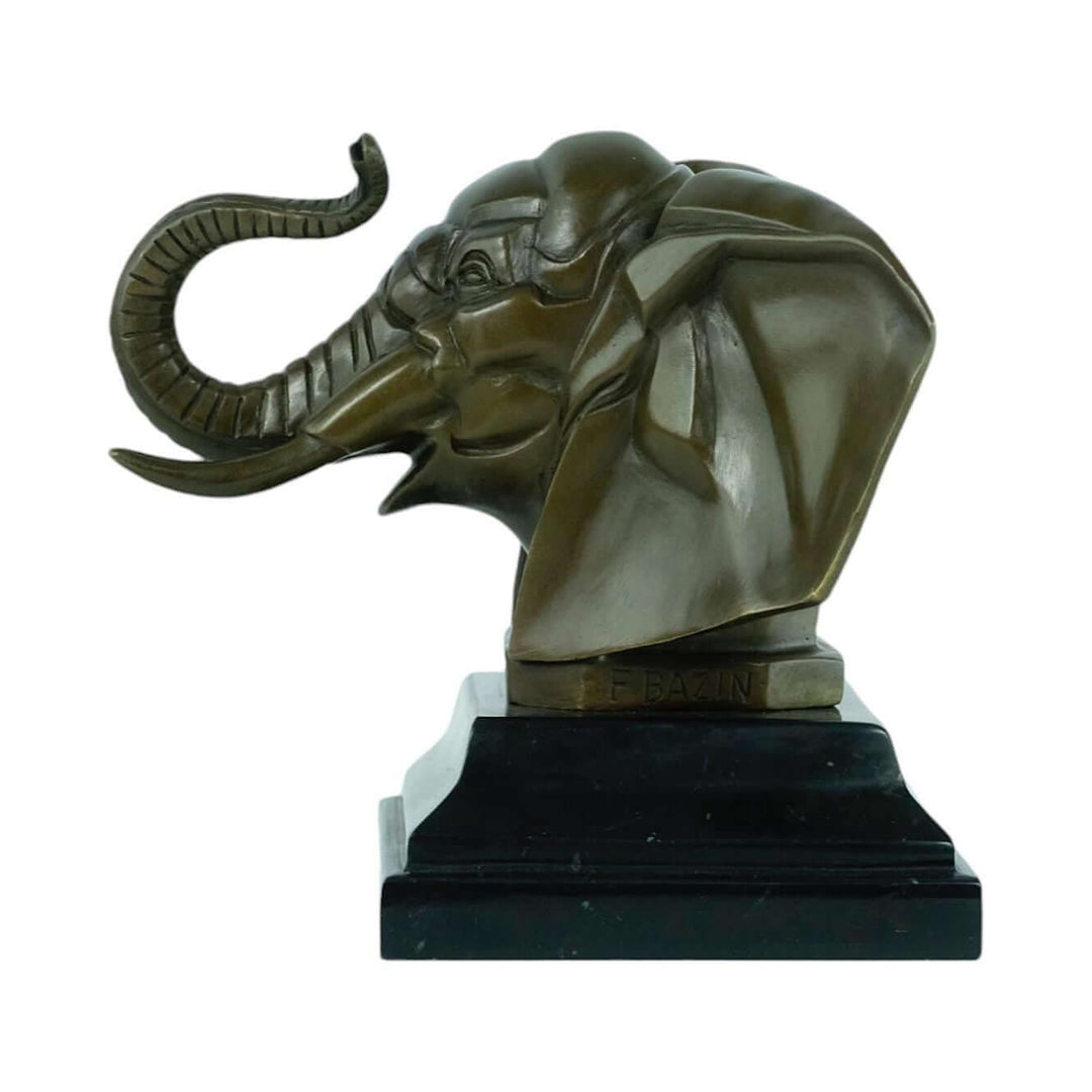 Bronze Art Deco elephant head sculpture with raised trunk and tusks mounted on a black marble base.