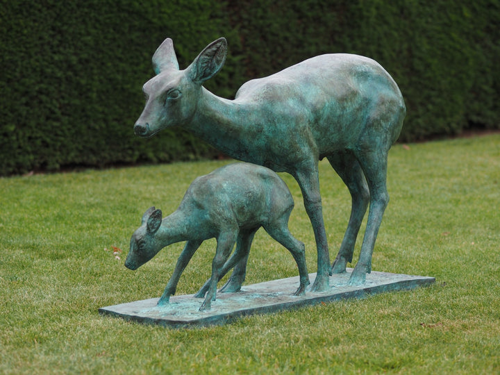 Bronze sculpture of a doe with her fawn
