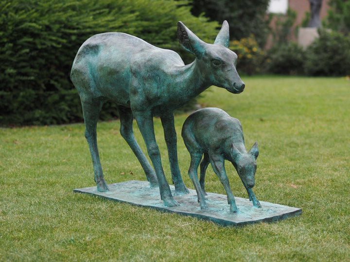 Bronze sculpture of a doe with her fawn