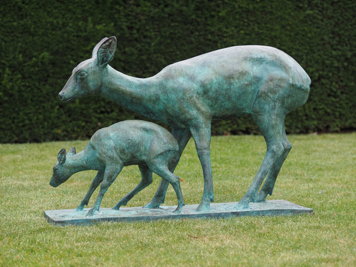 Bronze sculpture of a doe with her fawn