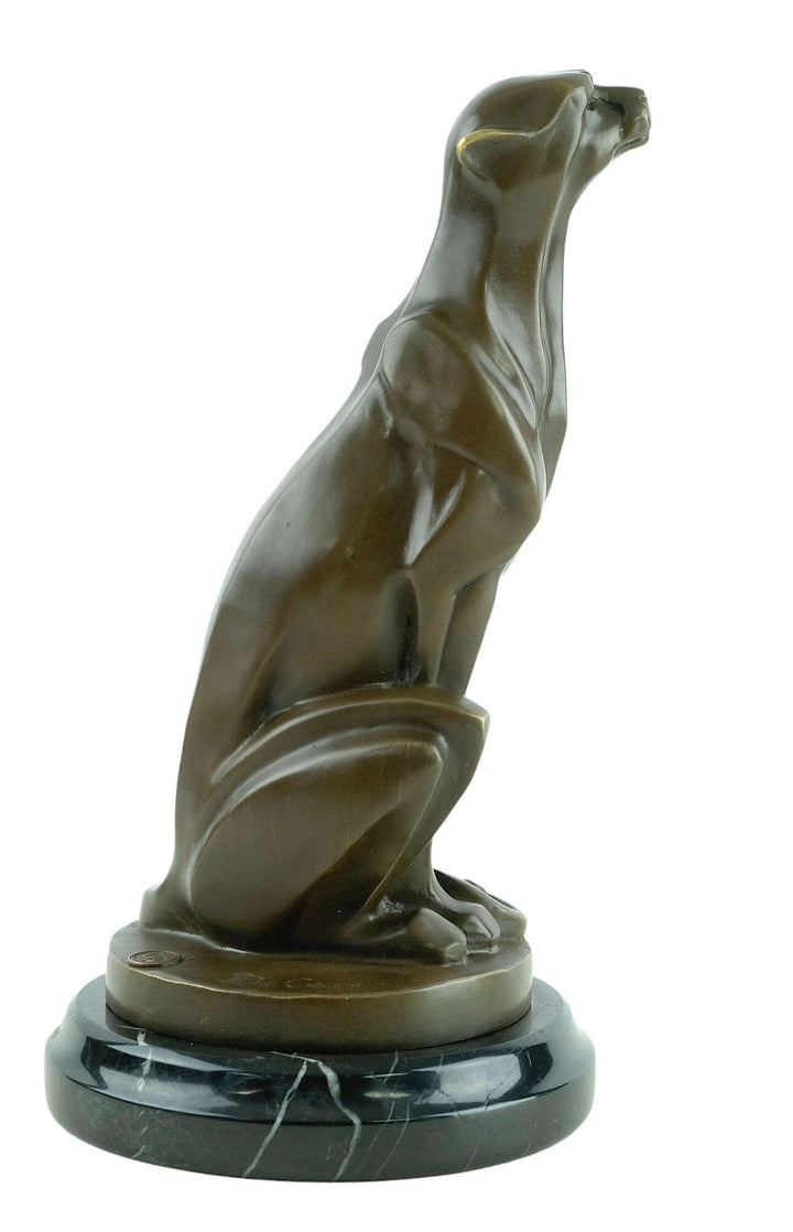 Art Deco bronze sculpture of a sitting cheetah on marble base, signed by Michel Decoux, 30 cm tall.