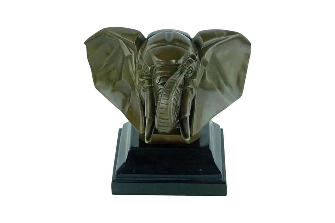 Art Deco bronze sculpture of an elephant head on a marble base, featuring detailed ears and tusks.