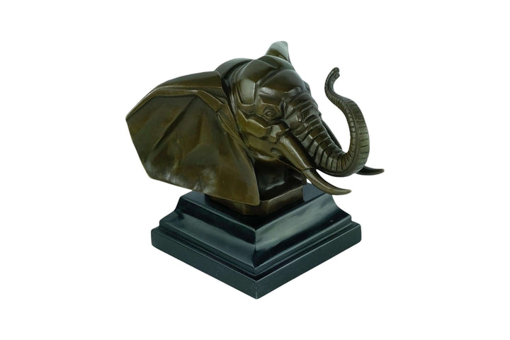 Art Deco bronze sculpture of an elephant head with trunk raised, mounted on marble base, detailed craftsmanship.