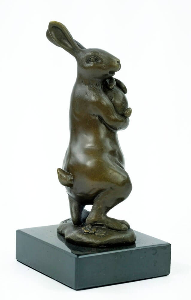 Bronze bunny statue holding a young bunny on a marble base, signed by Milo. Perfect for bunny lovers and art collectors.
