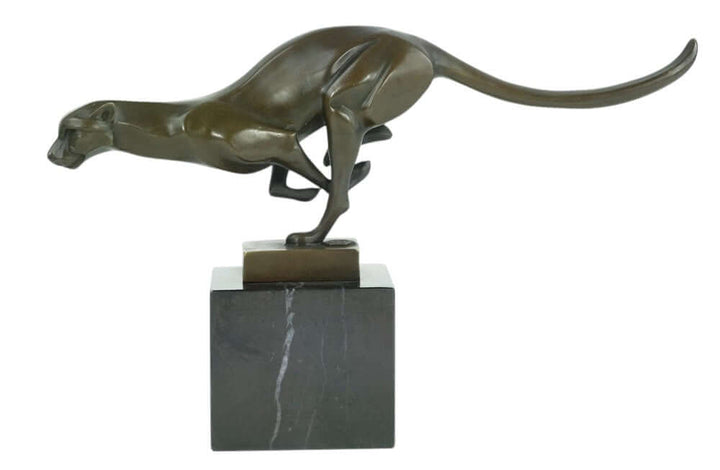 Bronze sculpture of a cheetah in motion, mounted on a black marble base, showcasing sleek design and fine craftsmanship.