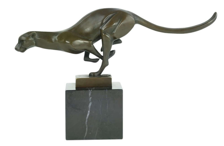 Bronze sculpture of a cheetah in motion, mounted on a black marble base, showcasing sleek design and fine craftsmanship.