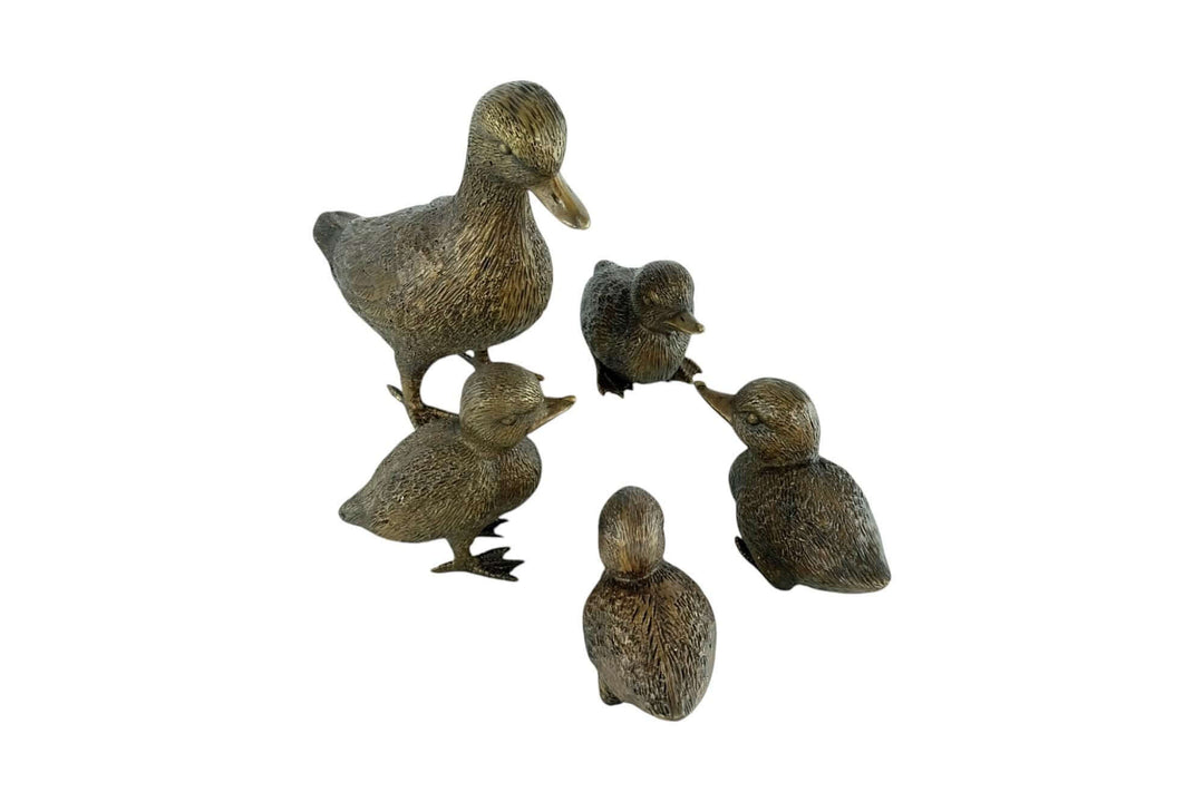 Bronze duck sculpture set with ducklings, displaying a nature-inspired design for home or garden decor.