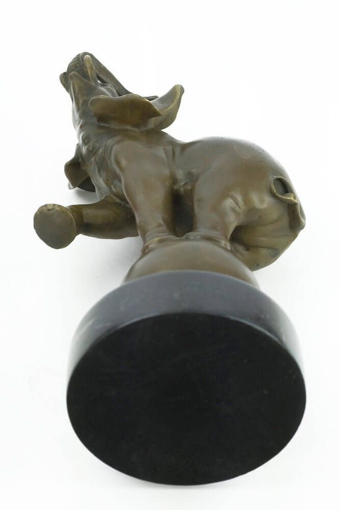 Bronze elephant sculpture balancing on ball, mounted on a round marble base, signed by Milo. 33 cm high.