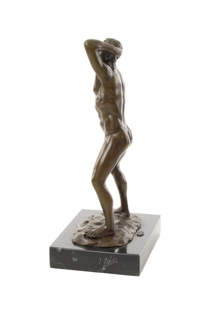 Bronze sculpture of a muscular nude male holding his phallus on marble base, 30 x 12 x 17 cm, 3 kg.