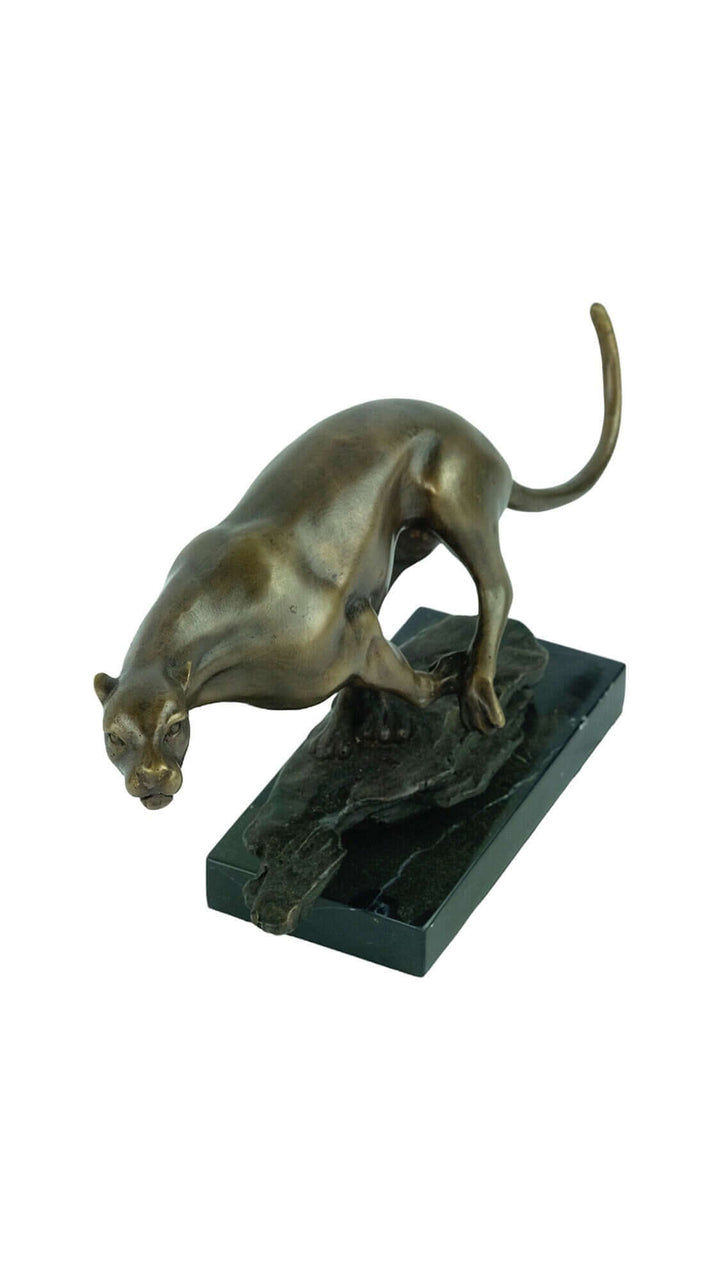 Bronze sculpture of a jaguar running on a marble base, showcasing detailed animal art and dynamic form.