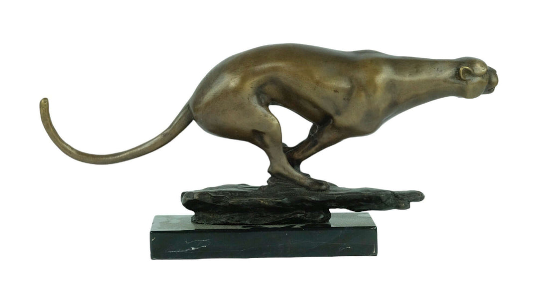 Bronze sculpture of a jaguar running on a marble base, showcasing detailed wildlife art in bronze.
