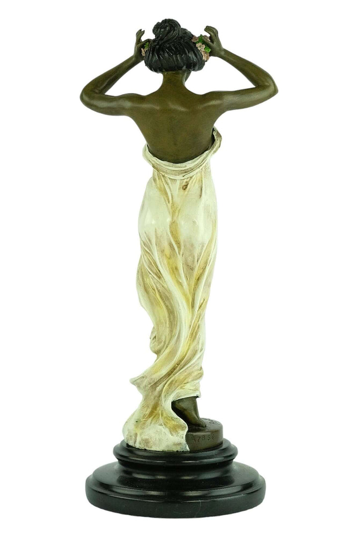 Bronze sculpture of a standing nymph with floral decorations in her hair, showcasing intricate Art Nouveau style.