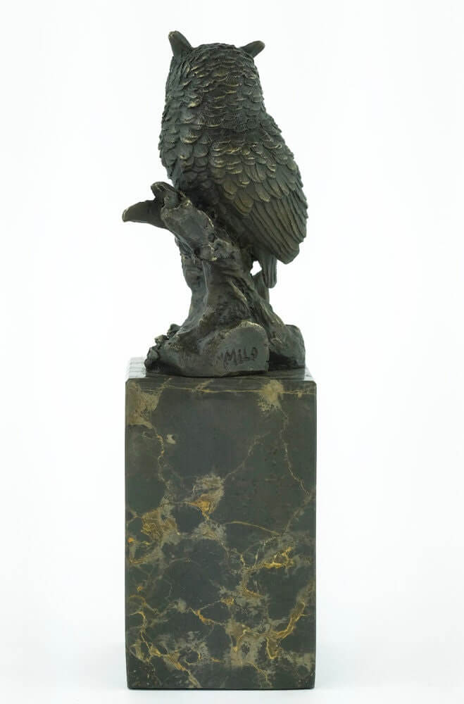 Bronze sculpture of an owl on a branch, detailed design by Milo, mounted on a flamed marble base.