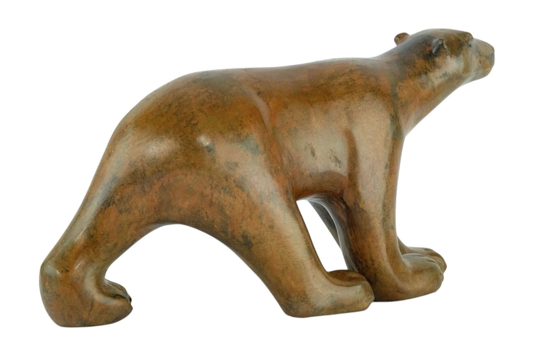 Bronze polar bear sculpture by Pierre Chenet, showcasing a walking bear with rich patina and fine details.