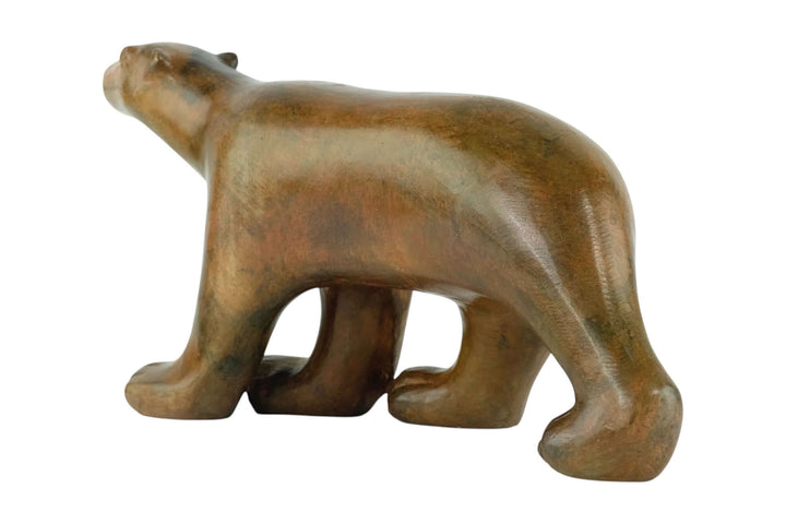 Bronze polar bear sculpture by Pierre Chenet, intricately designed with authentic patina, dimensions 17x34 cm.