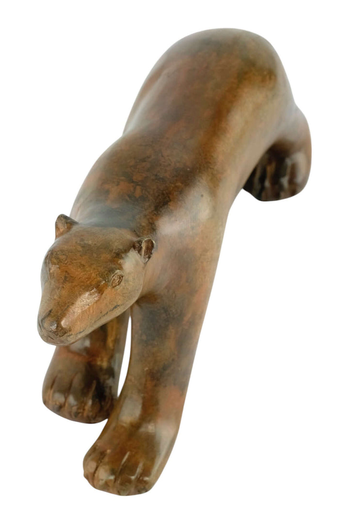 Bronze polar bear sculpture by Pierre Chenet, 17x34 cm, showcasing authentic patina and elegant design.