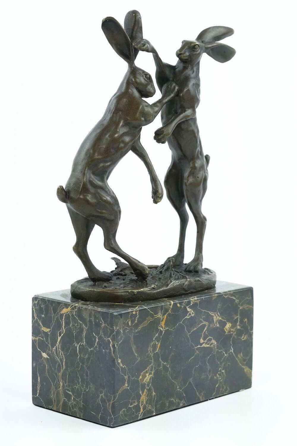 Bronze sculpture of two boxing hares on marble base, 24 cm high, signed by Nick, decorative animal collectible.