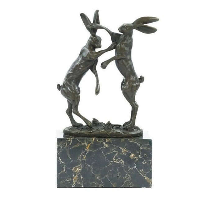 Bronze sculpture of two boxing hares on flamed marble base, 24 cm tall, signed by artist Nick, decorative collectable.