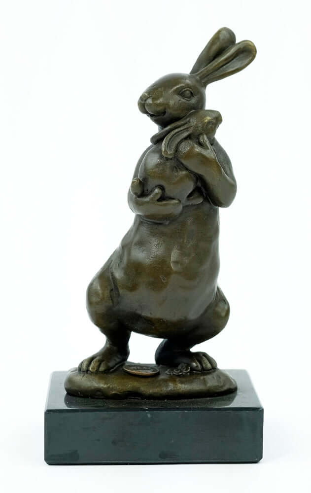 Bronze statue of a bunny holding a young, mounted on a marble base, signed by artist Milo, height 17 cm.