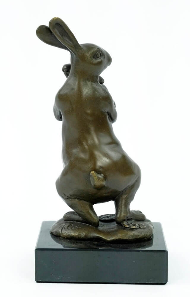 Bronze bunny statue holding a young, mounted on marble base, signed 'Milo', perfect for animal art lovers.