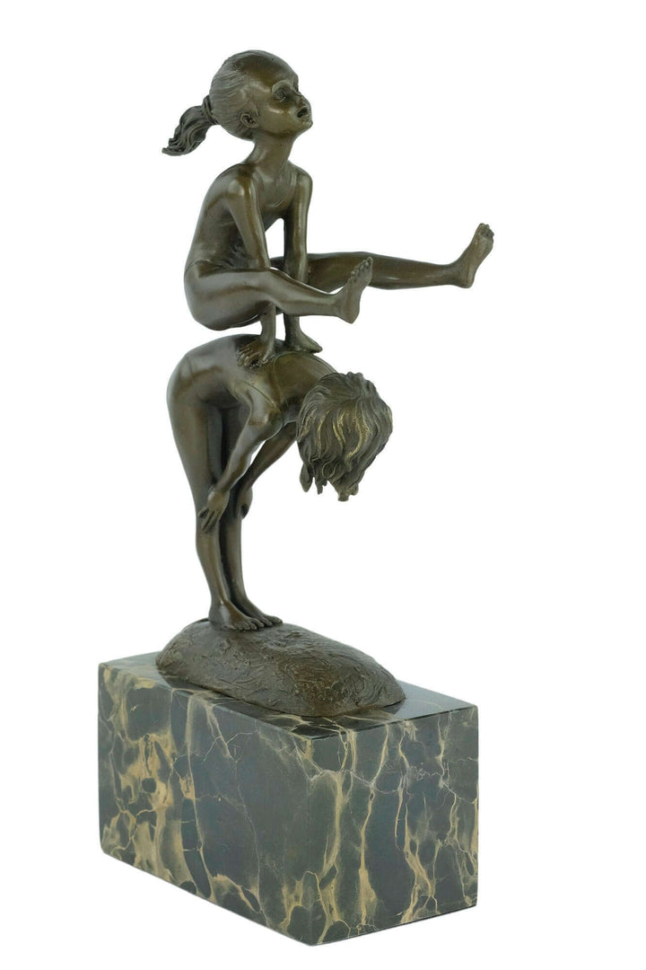 Bronze sculpture of children playing leapfrog on flamed marble base, signed 'Milo', 28 cm tall, decorative art piece.