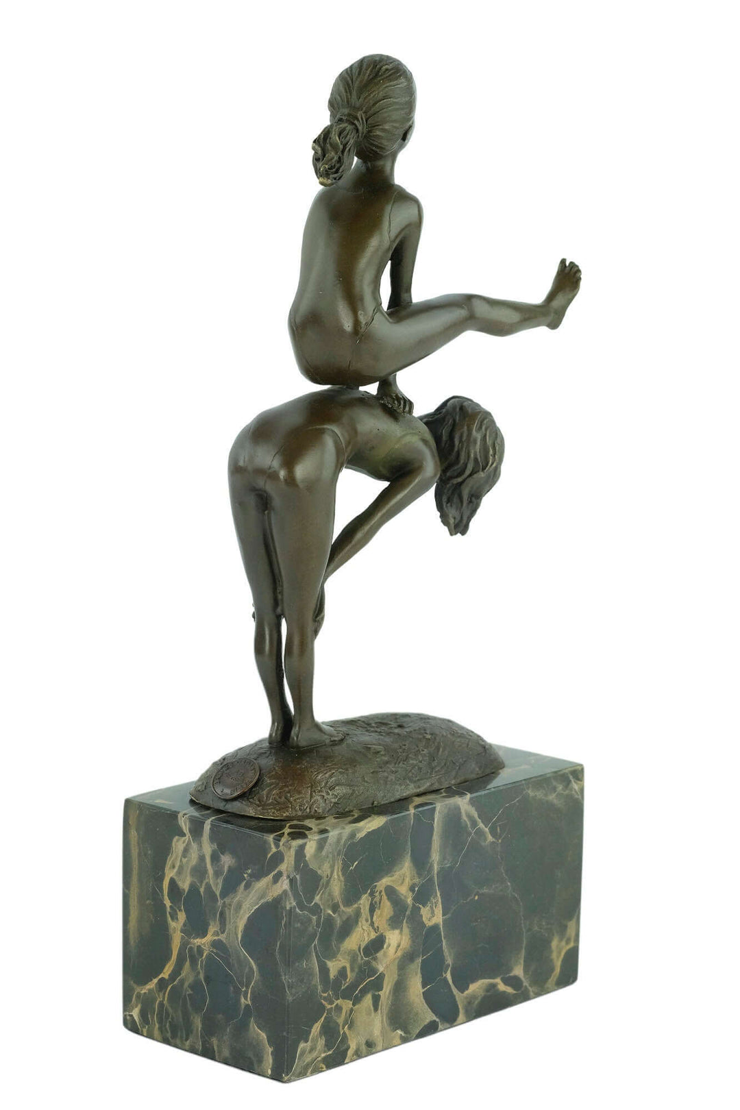 Bronze sculpture of two children playing leapfrog, with detailed figurines on a flamed marble base, signed 'Milo'.