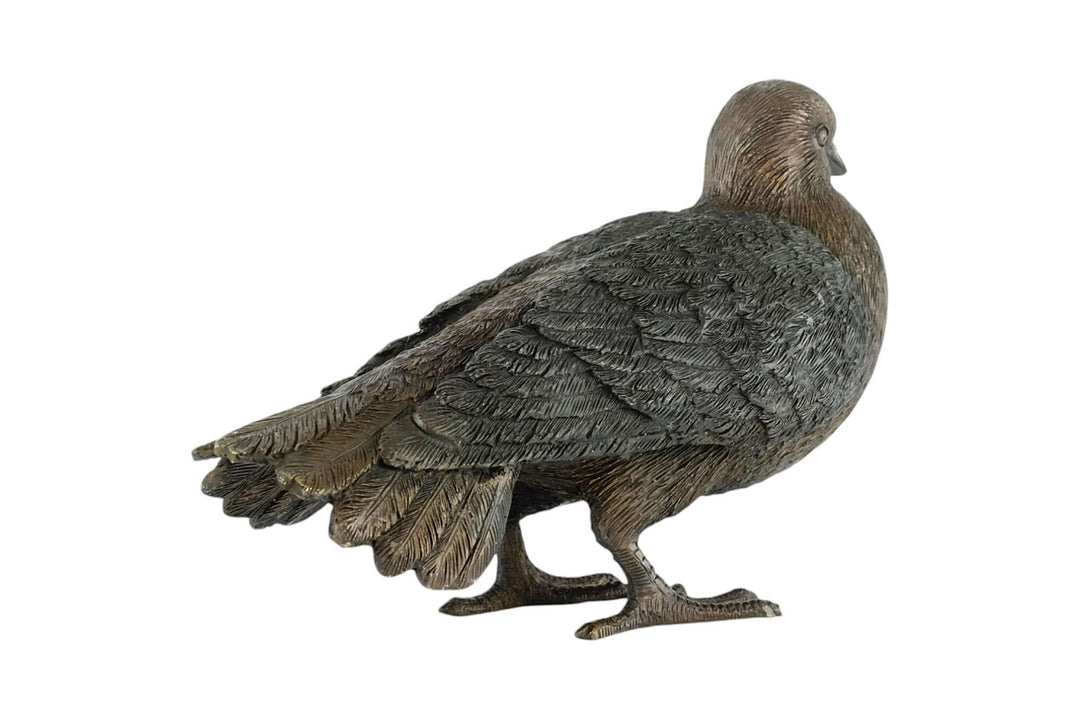 Bronze sculpture of a standing pigeon with detailed feathers, perfect for home or garden decor.