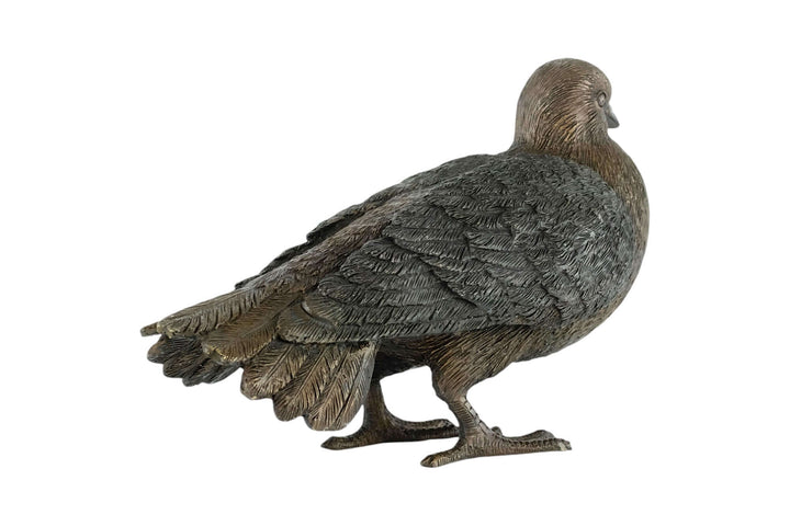 Bronze sculpture of a standing pigeon with detailed feathers, perfect for home or garden decor.