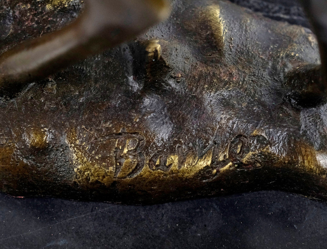Close-up of signature on bronze sculpture by Antoine-Louis Barye, depicting a doe and her fawn.