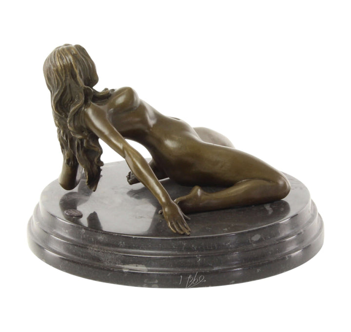 Elegant bronze sculpture of a nude female leaning backwards, mounted on a round marble base, 14 x 20 cm.