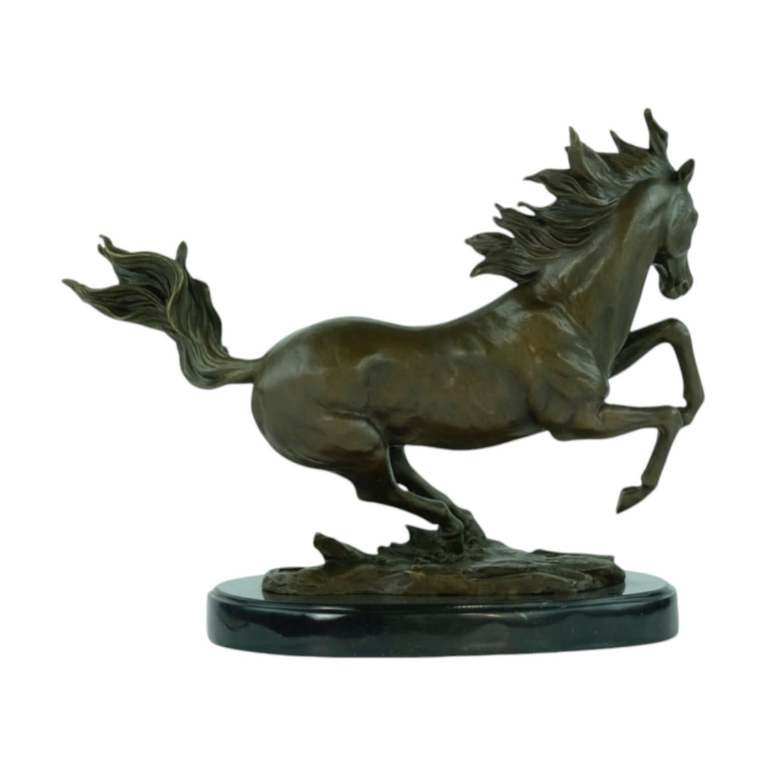 Detailed bronze sculpture of a galloping horse on a marble base, showcasing a majestic design and graceful motion.
