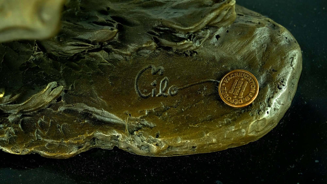 Signature 'Milo' and foundry stamp on the base of a detailed bronze sculpture of a galloping horse.