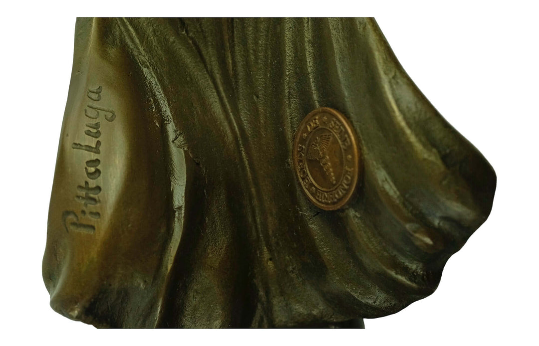 Close-up of the signature 'Pittaluga' on the bronze Gelle Fra sculpture with detailed texture.